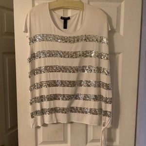 White knit cap sleeved shirt with stripes of silver sequins and side tie, 1X